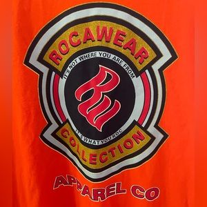 Rocawear Men's Short Sleeve “It’s What You Roc” T Shirt, Orange, X-Large